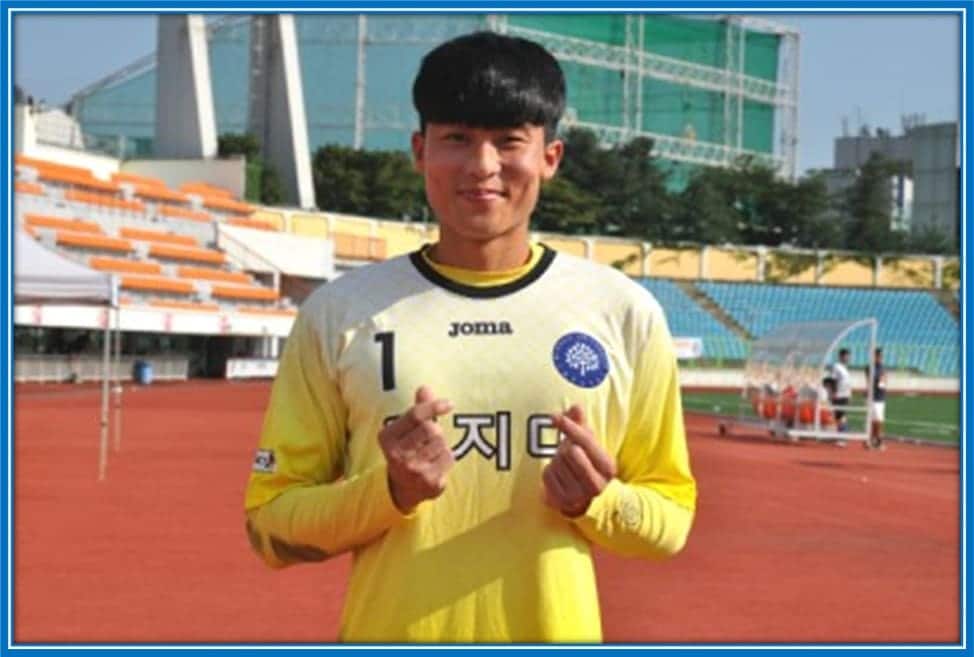 Min-jae's Brother, Kim Kyung-min, poses for a photo on a match day.