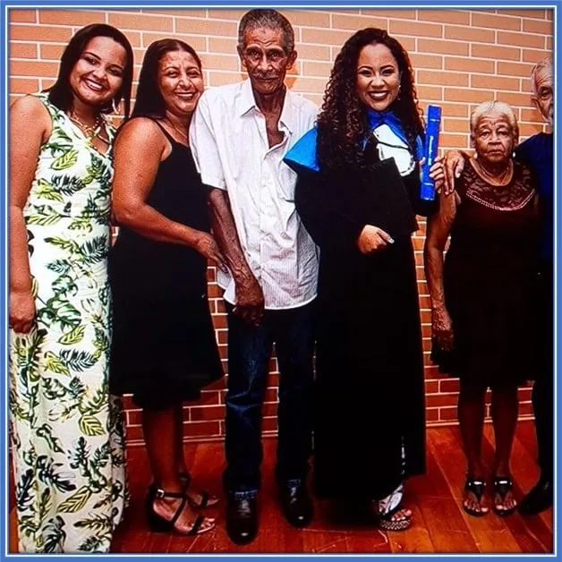 Savinho's Grandfather is pictured alongside his children and wife.