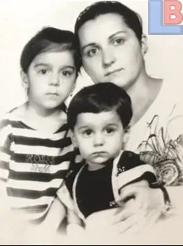 An old photo of Henrikh Mkhitaryan's Mum, himself and his sibling.