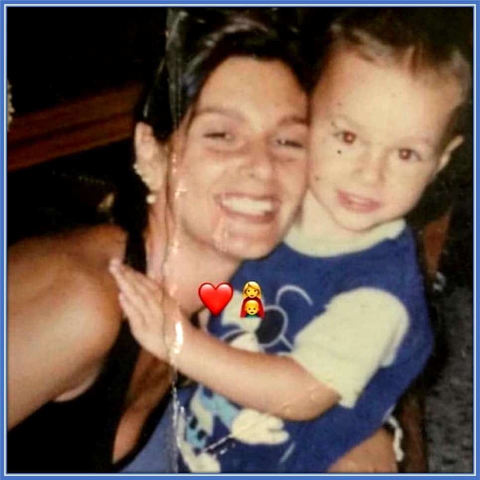 A one-year-old Gianluca Scamacca with his mother, Cristiana.