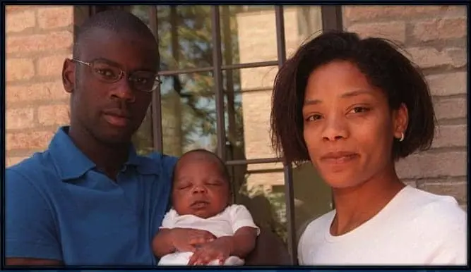 A cute baby photo of Marcus Thuram with his dad and mum. His family's origin is Guadeloupe.