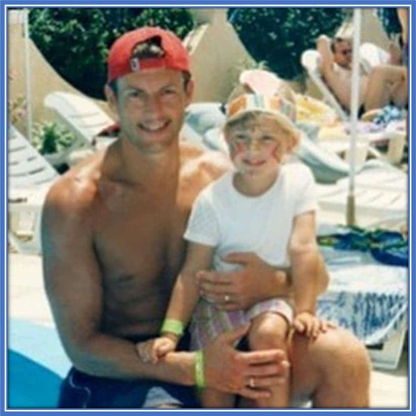 This is Kieffer Moore's wife during her childhood. Charlotte Russell is pictured alongside her Dad, Lee.