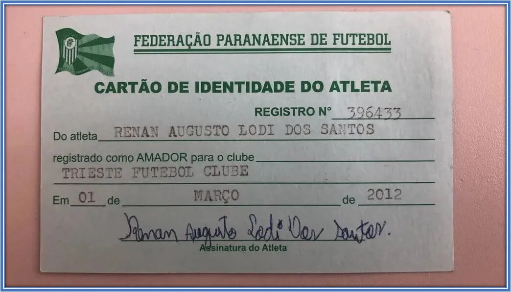 A certificate that shows the date he signed up for Trieste Football academy in his earliest career development.