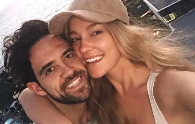 Love is in the air: Danny Ings and his partner Georgia Gibbs share a sweet moment as they gaze into each other's eyes