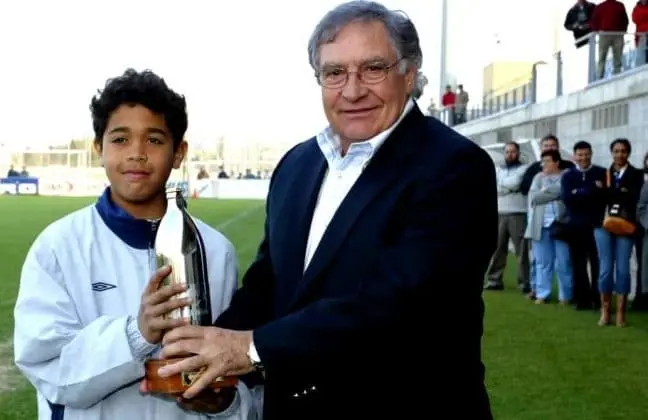 Mariano Diaz Childhood Photo- Here is him receiving an award as a kid footballer.