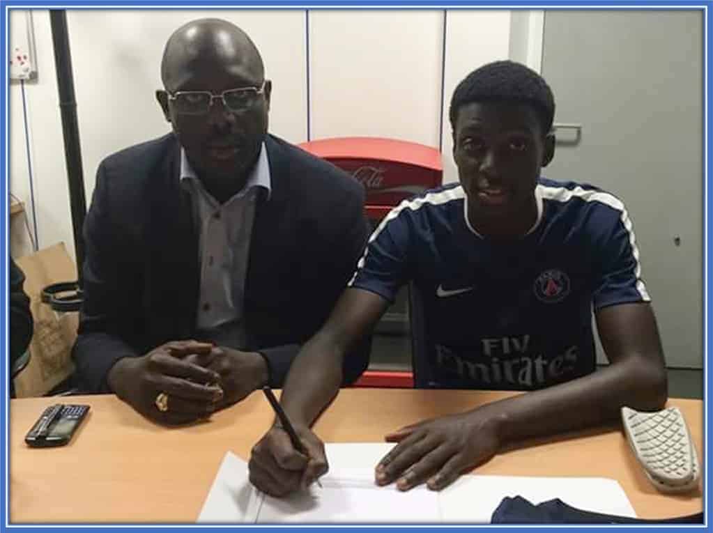 Weah was there for his son during his PSG contract signing.
