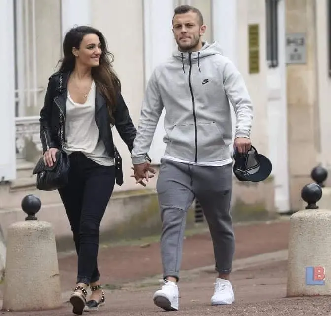Andriani Michael and Jack Wilshere step out.