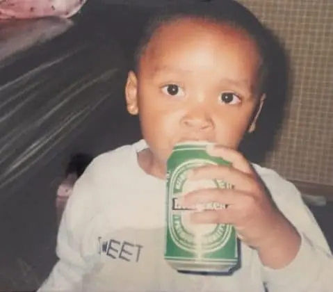 A rare photo of Steven Bergwijn pictured drinking Heineken as a child.