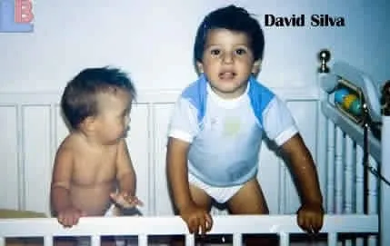 Young David Silva alongside his little brother.