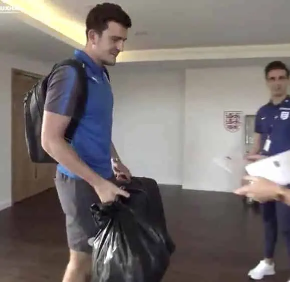 England's Newcomer Harry Maguire Raises Eyebrows by Swapping Designer Luggage for a Bin Bag at His First Senior Team Gathering.