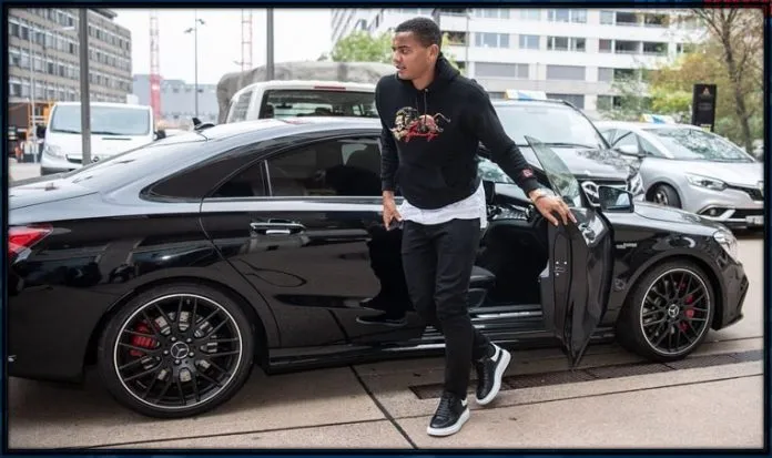 Manuel Akanji loves dressing in all black to match his car. Just as he does with his white close and car outfit.