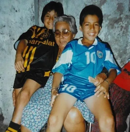 Luis Suarez and friend with his Grand Mum.