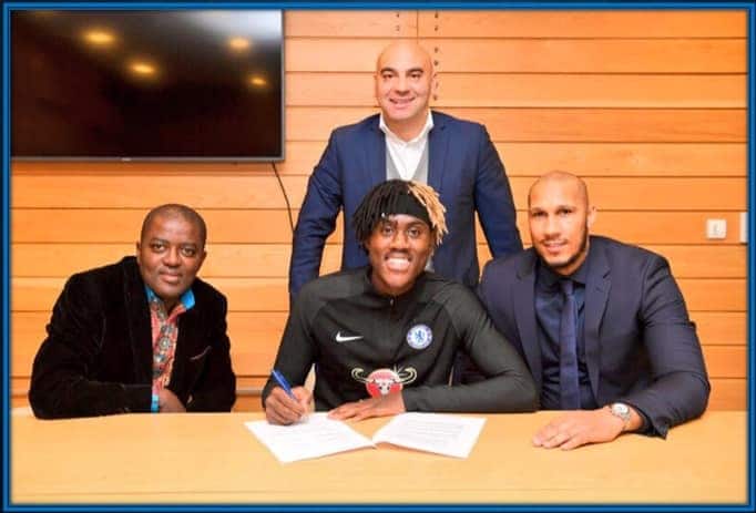 Meet Trevoh Chalobah Dad, alongside his agents.