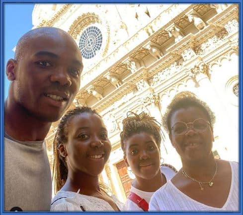 "Family Ties: Angelo Ogbonna, joined by his stunning sisters Paola and Emily, showcases their strong bond and shared love for exploring different cultures while dressed in elegant Asian outfits