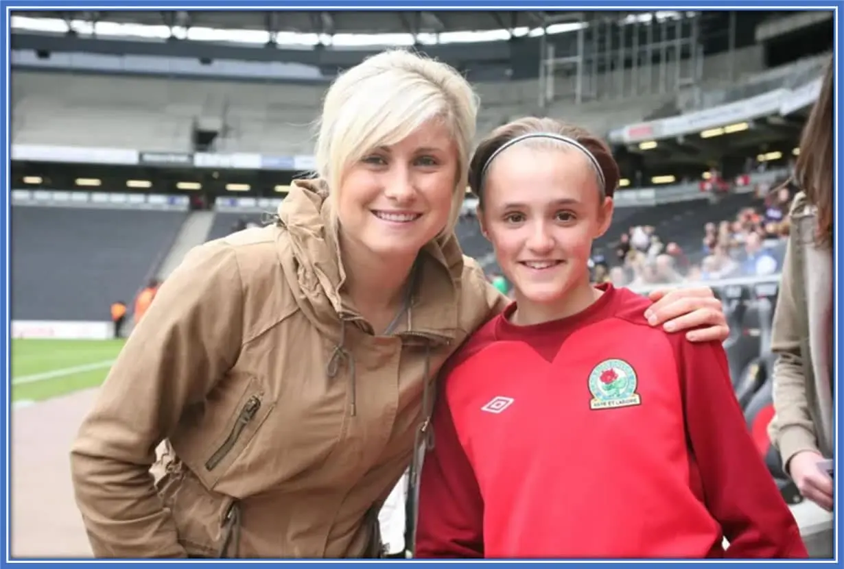 The photo of the young Georgia Stanway with Manchester City captain Steph Houghton during her early years in Blackburn Rovers. Image credit: Her Football Hub. 