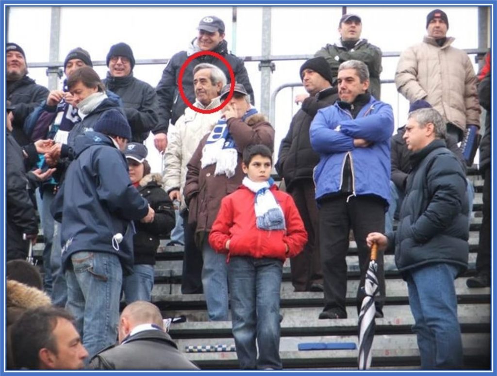 Alfredo De Zerbi (circled), beaming with pride among fellow Brescian supporters, during his son, Roberto De Zerbi's debut match for their hometown club, Brescia. Credit: Gianlucadimarzio.