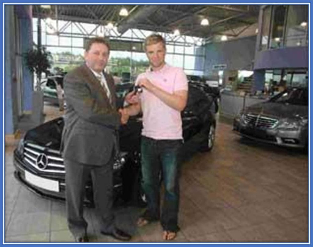 Eddie Howe receiving a Mercedes-Benz CLC-Class from Martin Slater.