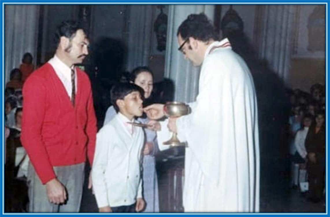 This is 11-year-old Adenor Leonardo Bacchi receiving his first communion.
