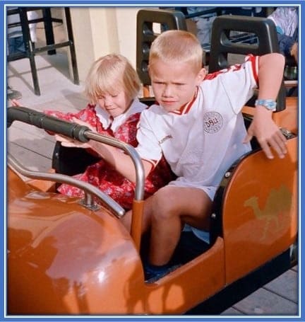 Childhood photo of Vestergaard with his sister Anna at an amusement park.