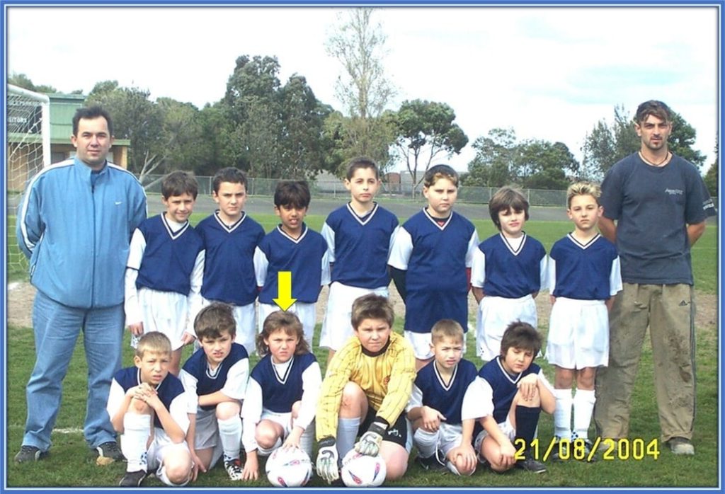 An eight-year-old Ajdin is pictured crouching third from the left. The BH Center Springvale is a team managed mainly by persons from Bosnian family origins.