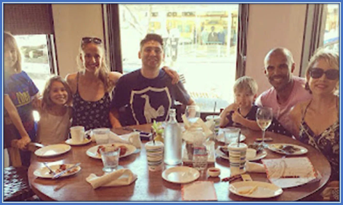 A happy photo of Ashleigh Plumptre's household members at the table.