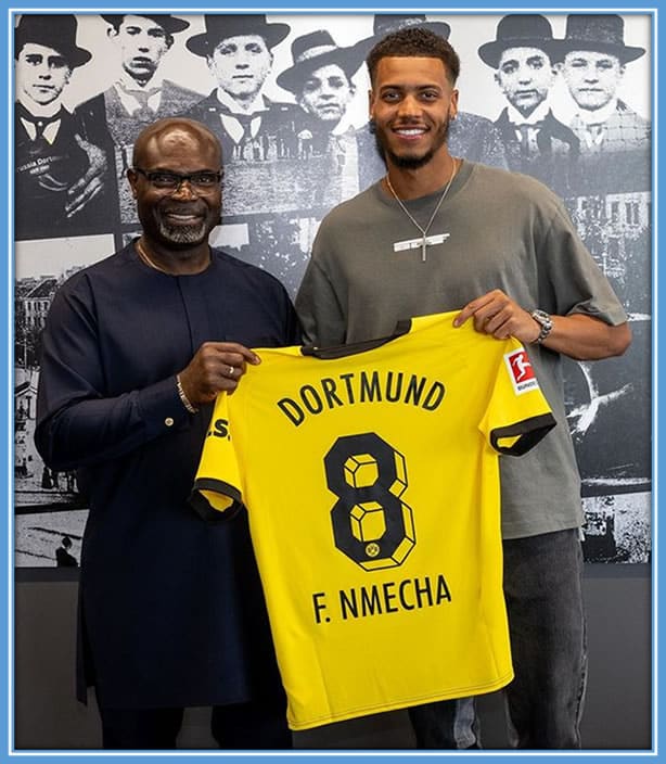 Felix Nmecha and his father kalu Nmecha strike a pose as a testament of the signed deal with Borussia Dortmund. Image: Instagram/Felix_Nmecha