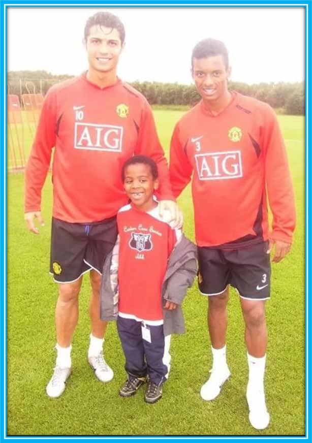 Imagine the joy on the face of Little Gomes as he Stands with his idols. Photo Source: The Mirror