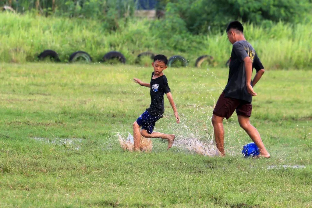 Illustrative stock photo: parent child soccer