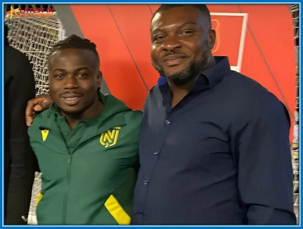Mr. Ugochukwu, a passionate football enthusiast, shares a moment with Nigerian winger, Moses Simon, during a Nantes match &mdash; showcasing their close camaraderie.
