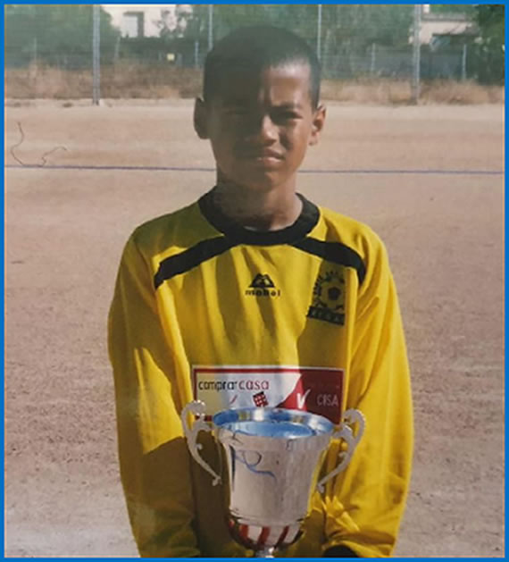 Behold Robert Sanchez in his childhood phase with a trophy he won. Source: Google.
