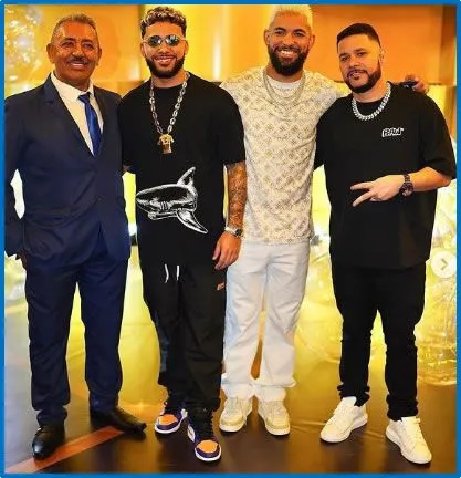 Davison and Daniel with Douglas Luiz Dad stand beside their brother. Picture: Instagram danieluiz83. 