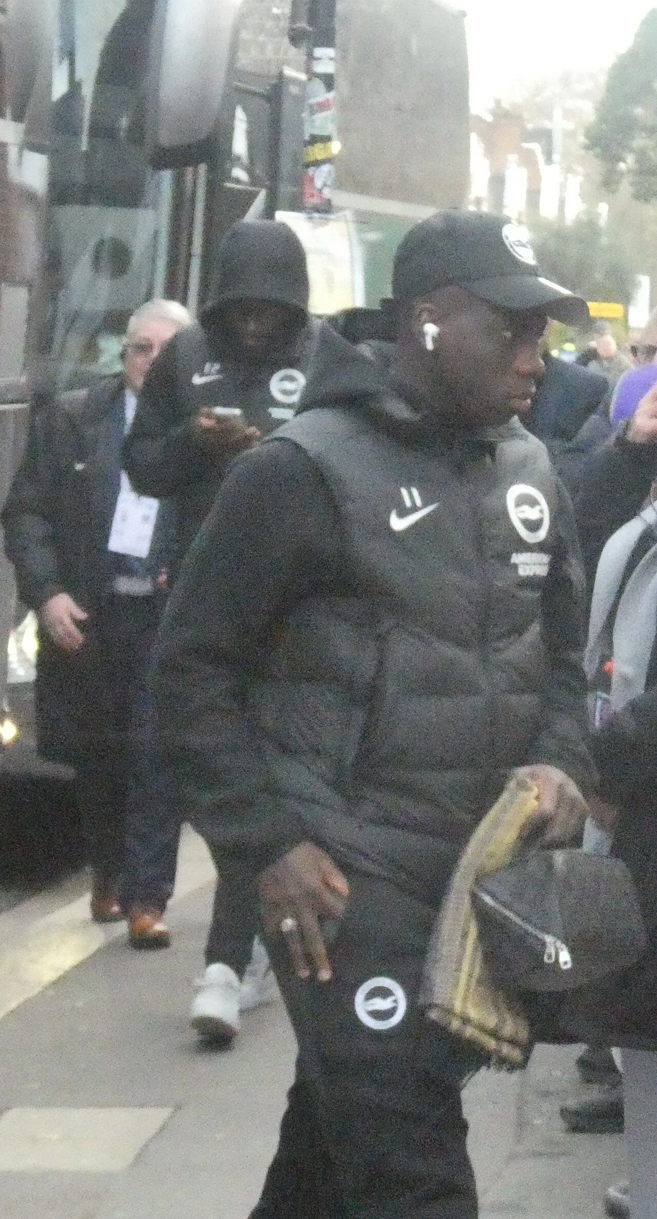 Manchester United midfielder in action at Old Trafford under stadium lights