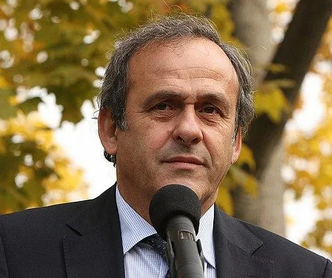 Football legend at press conference discussing modern football values, August 2026