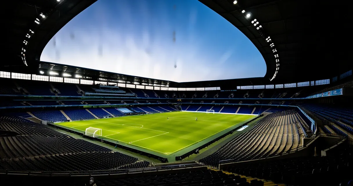 Pemain Chelsea merayakan gol di Stamford Bridge di bawah sorotan lampu stadion