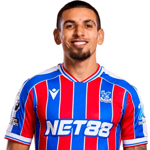 Colombian right-back defender sprinting in Premier League match under floodlights