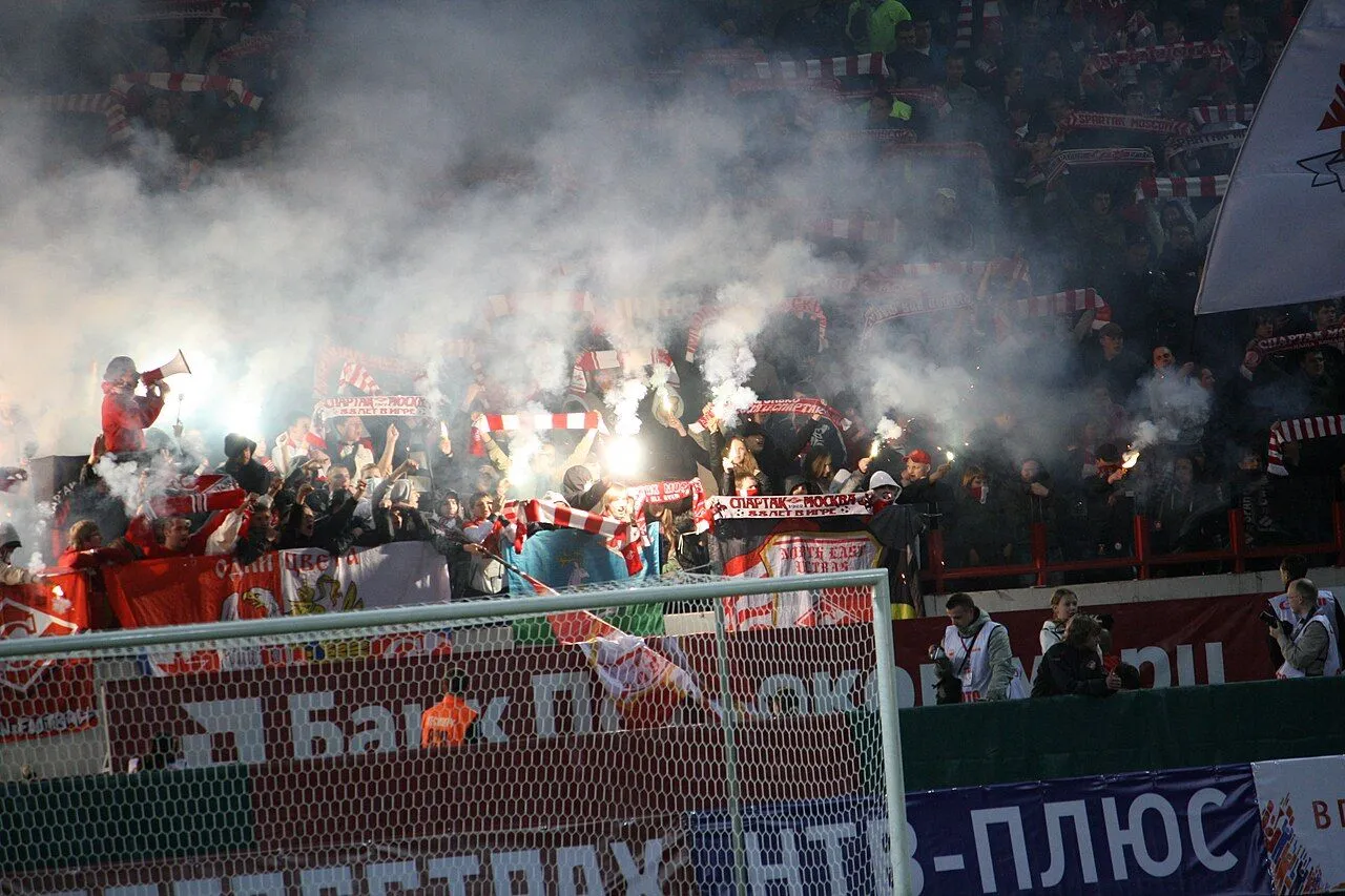 Spartak Moscow footballer celebrates scoring in packed Lukoil Arena